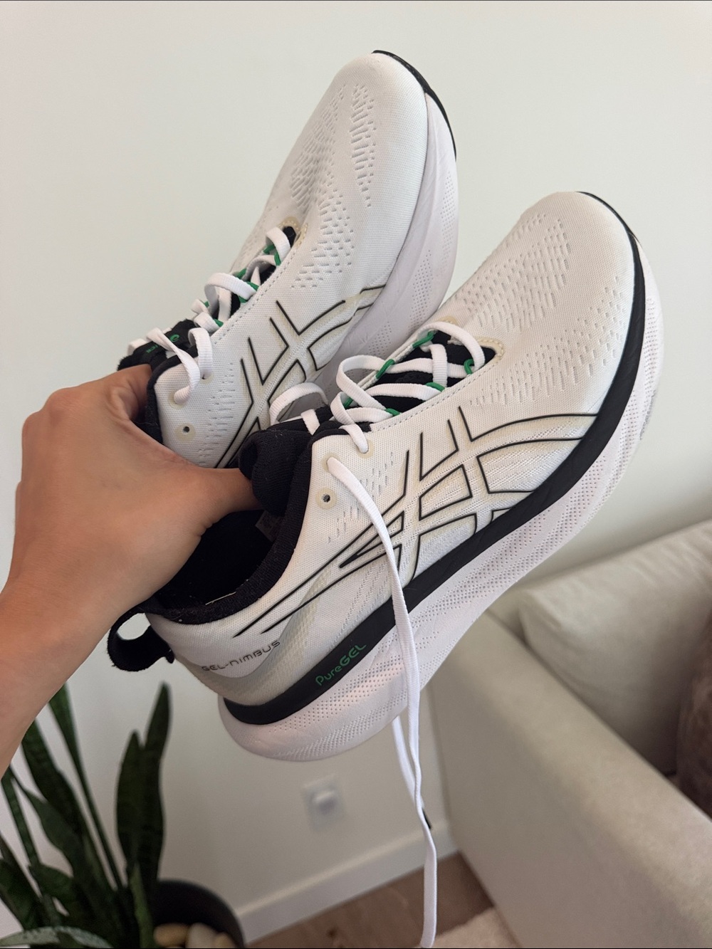 ASICS White and Black men’s Athletic Running Shoes with Green Accents